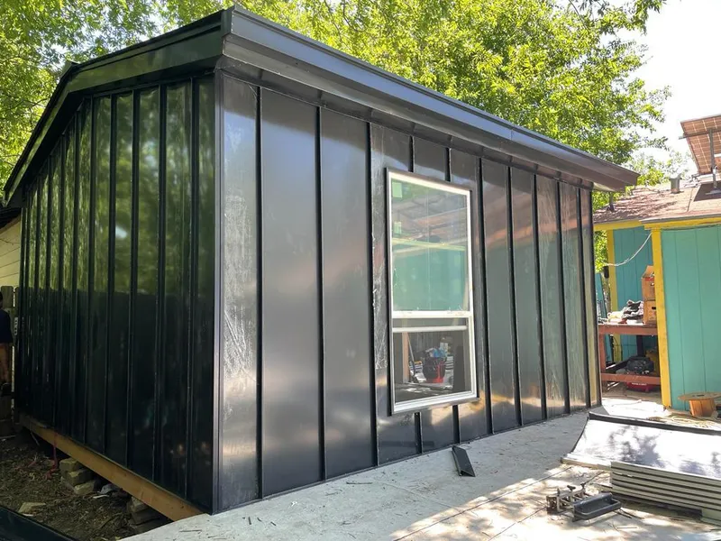 Black standing seam metal wall panels for Roof Inspection in East Haddam